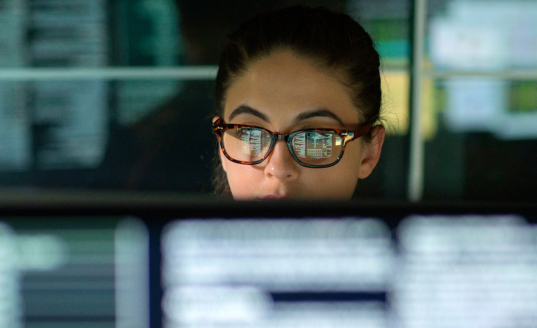 Woman looking at computer